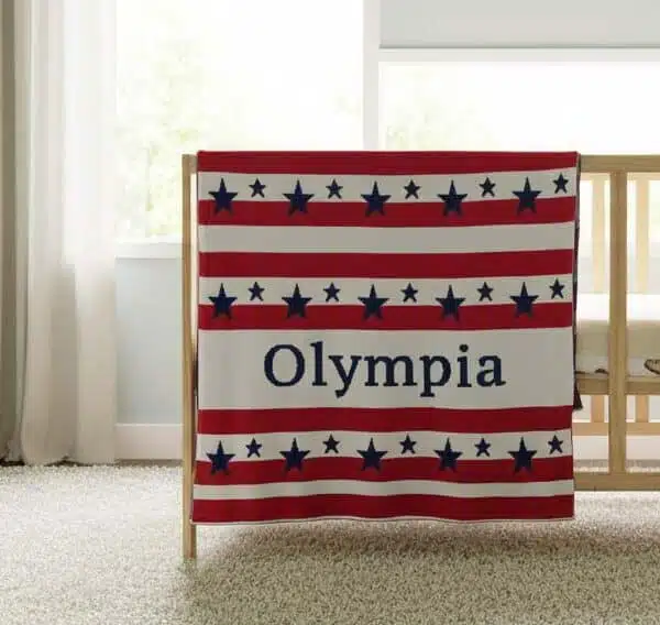 Olympia-american-stars-stripes-blanket-in-baby-room-nursery